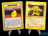 two pokemon cards that are on display on a black background