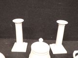 a lot of white objects that are on the table