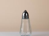 a salt and pepper shaker sitting on a table
