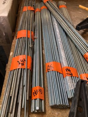 a pile of gal steel pipes sitting on top of a table