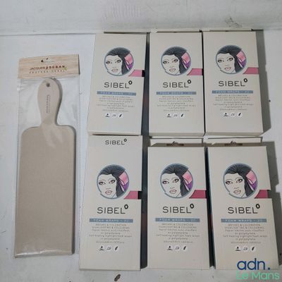 six boîtes de produits capillaires Sibel posées sur une table