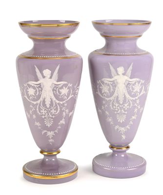 pair of purple vases with white designs on them on a white background