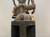 an image of a statue of a man on a horse with a bird on its back