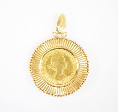 a close up of a gold coin with a woman ' s face on it