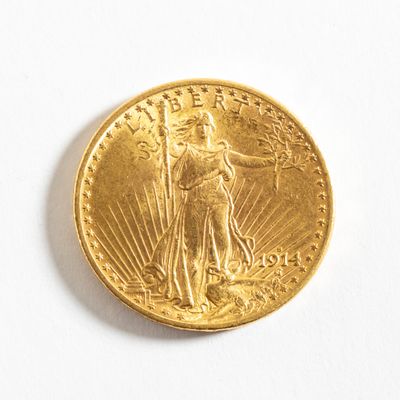une image d'une pièce d'or sur une surface blanche