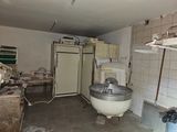 an image of a kitchen with a sink and a refrigerator