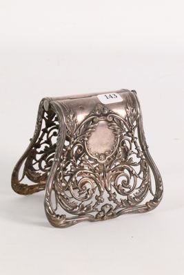 pair of antique silver napkin rings with a pink stone center