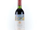 a bottle of wine that is sitting on a table