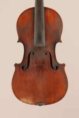 an old violin with a bow on a white background