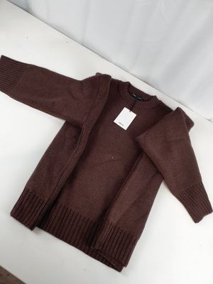 the sweater is brown and has a white tag on it
