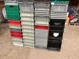 many plastic containers stacked on top of each other
