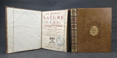 the front and back pages of a book with a gold seal on it
