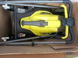 a box that has a yellow and black vacuum in it