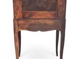 an old wooden table with a drawer on top of it