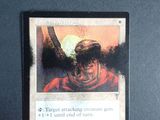 a close up of a card with a picture of a man on it