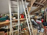a ladder that is leaning against a wall in a room