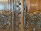a large wooden door with intricate carvings on it
