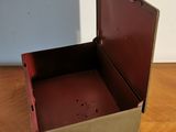 a small open box sitting on a wooden table