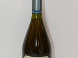 a bottle of wine that is sitting on a table