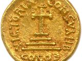 an image of a gold coin with a cross on top of it