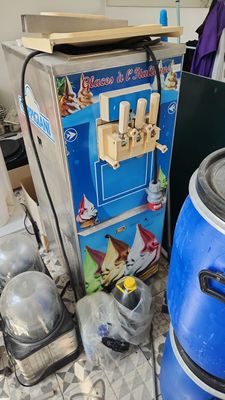 a blue and white ice cream machine next to a blue and white ice cream machine