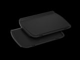 two black trays on a black surface with a black background