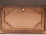 an old wooden picture frame with a picture on it