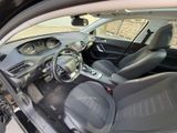 the interior of a car with a steering wheel and a dash board