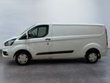 a white van that is parked in a parking lot