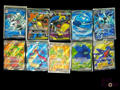 a lot of different pokemon cards on the table