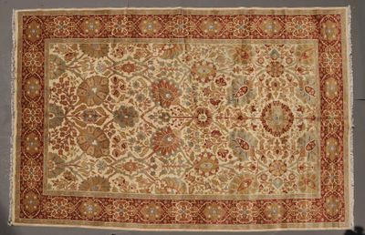 tapis persan ancien à motif floral sur fond beige