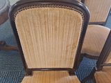 two chairs that are sitting next to each other on the floor