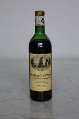 a bottle of wine that is sitting on a table