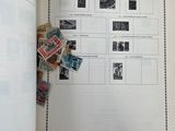 an open book with a bunch of stamps on it