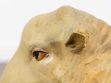 a close up of a statue of a sheep