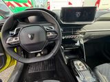 the interior of a car with a steering wheel, dashboard and dashboard controls