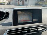the dashboard of a car with a camera mounted to it ' s dashboard