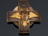 an image of a cross with a crown on it