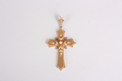 une croix dorée sur fond blanc, surmontée d'une étoile