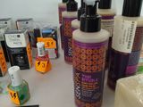 many different types of hair care products on a table