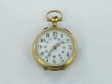 a gold pocket watch with a white face on a white surface