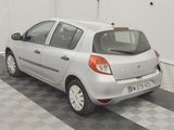 a picture of a small car parked in a garage