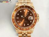 an image of a gold rolex watch with a brown dial