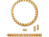 a gold and pearl necklace, bracelet and ring set