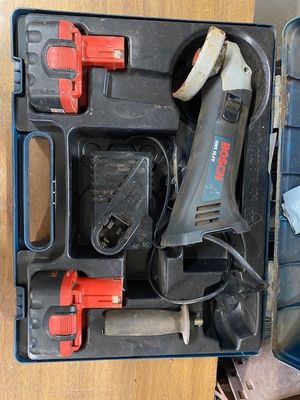 a box with tools in it sitting on a table