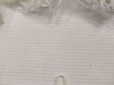 a measuring tape and a pair of scissors next to a pair of scissors