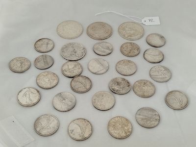 a lot of coins that are on the table