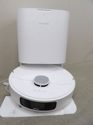 une cuvette blanche posée sur un meuble blanc