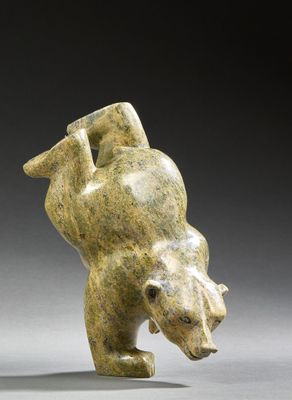 an image of a sculpture of a bear on a gray background