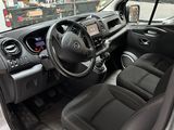 the interior of a car with a steering wheel, dashboard, and dashboard controls
